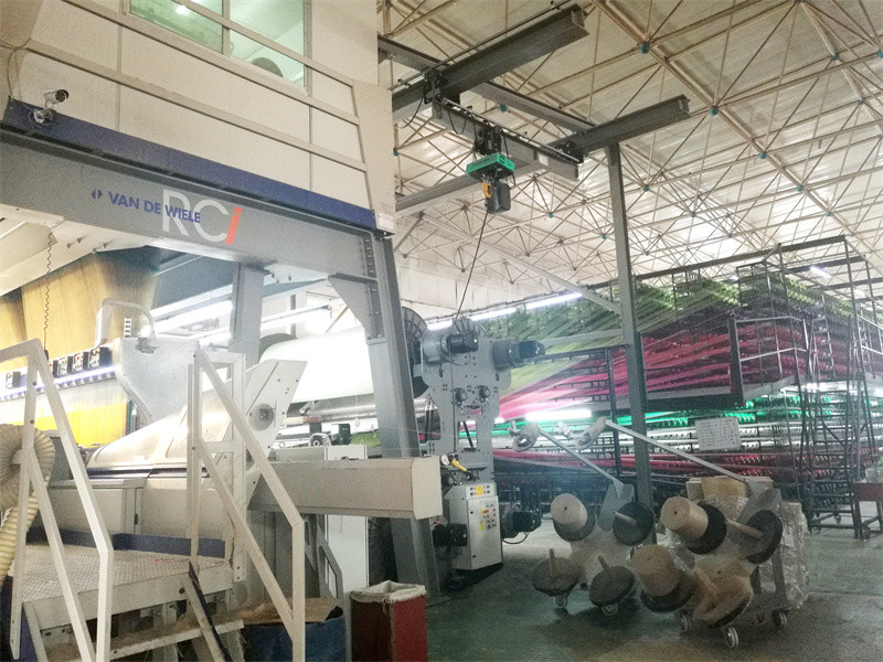 Foshan New Dream Carpet Co., Ltd. ligne de production en usine